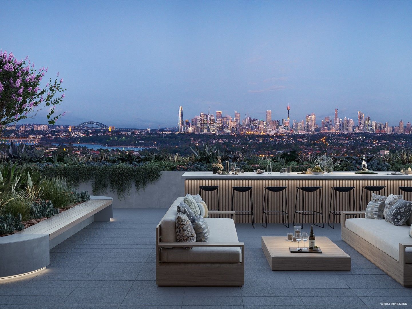 A view of the sydney skyline from a rooftop terrace.
