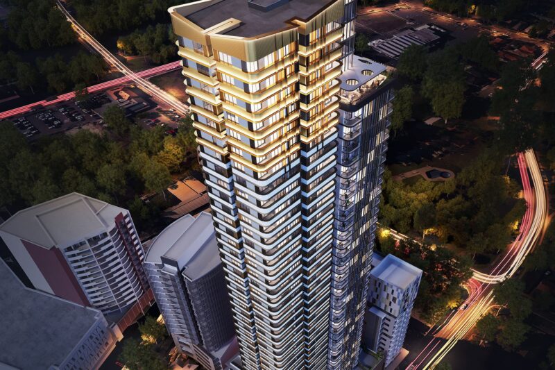An aerial view of a tall building at night.